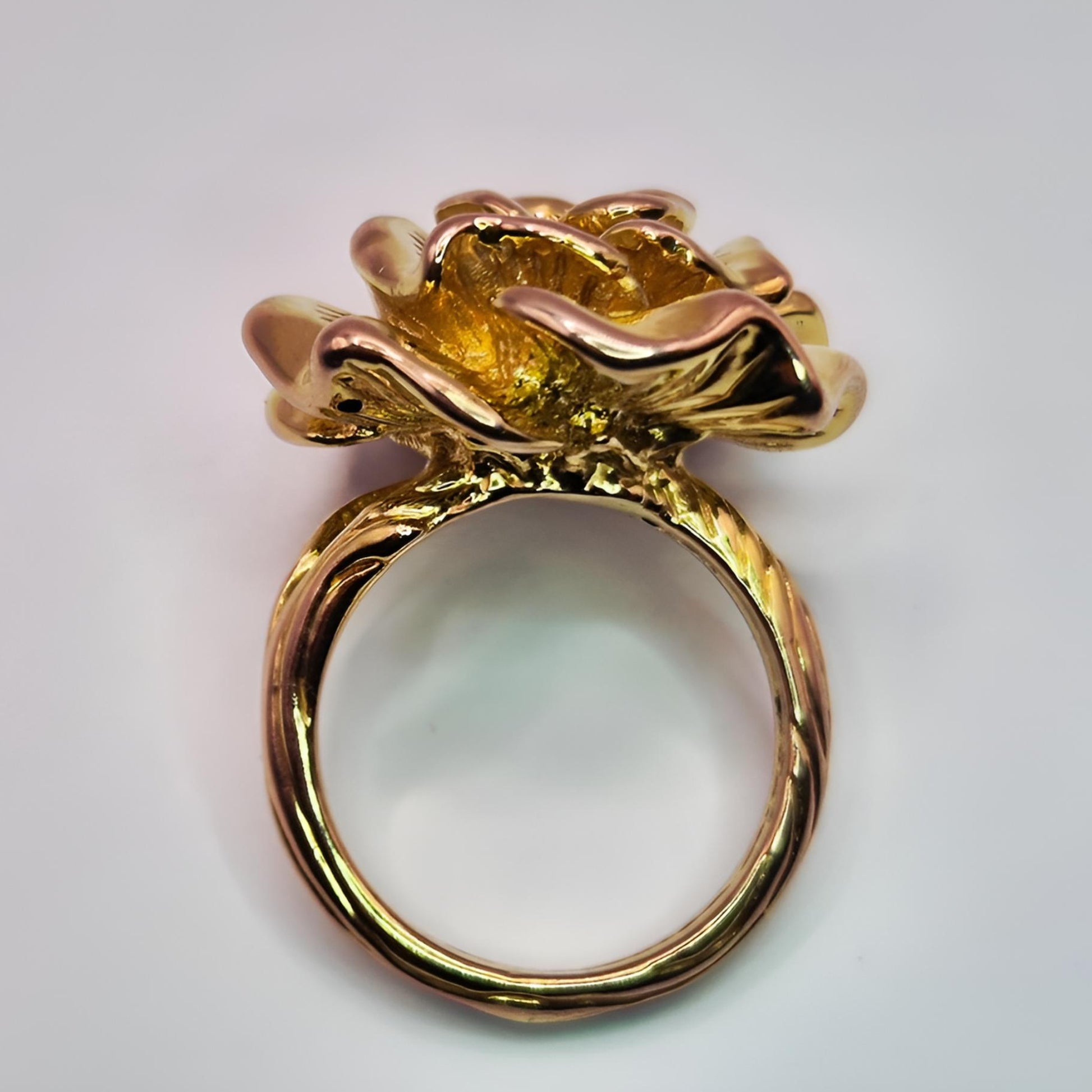 14ct gold flower cocktail ring above