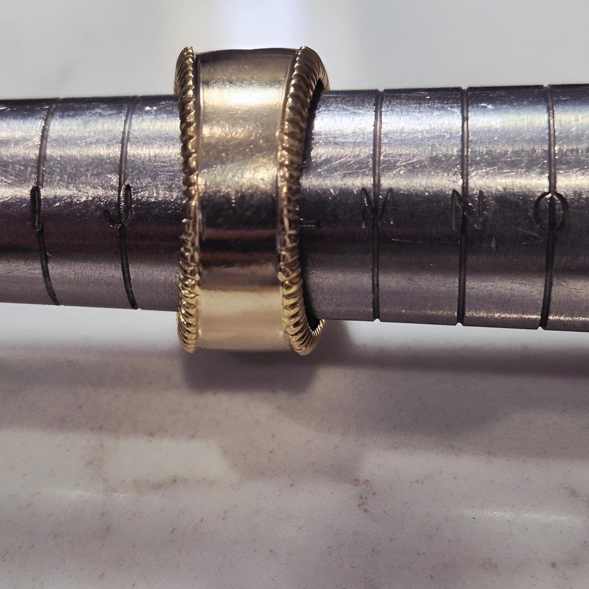 18carat gold pave 5 row diamond ring on ring stick