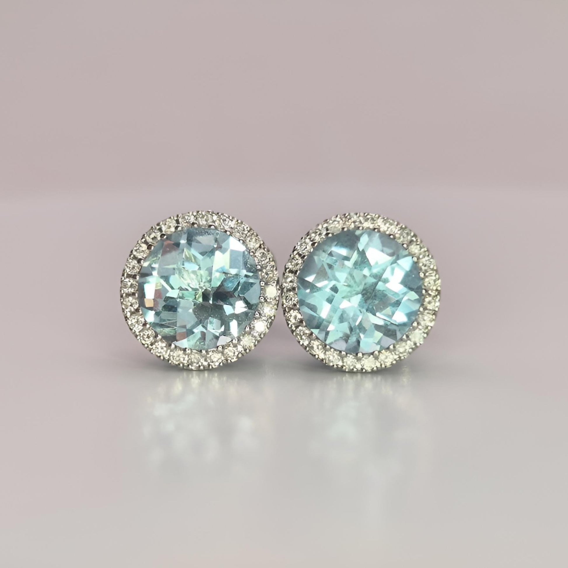 18ct white gold aquamarine and diamond halo cluster earrings front view
