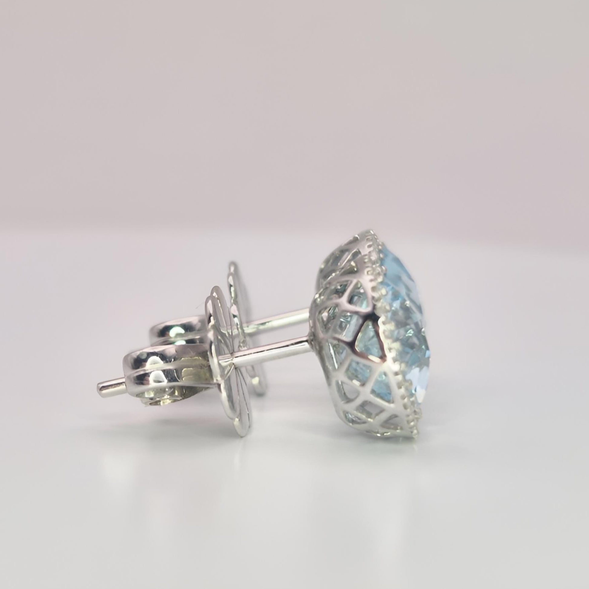 18ct white gold aquamarine and diamond halo cluster earrings right side view