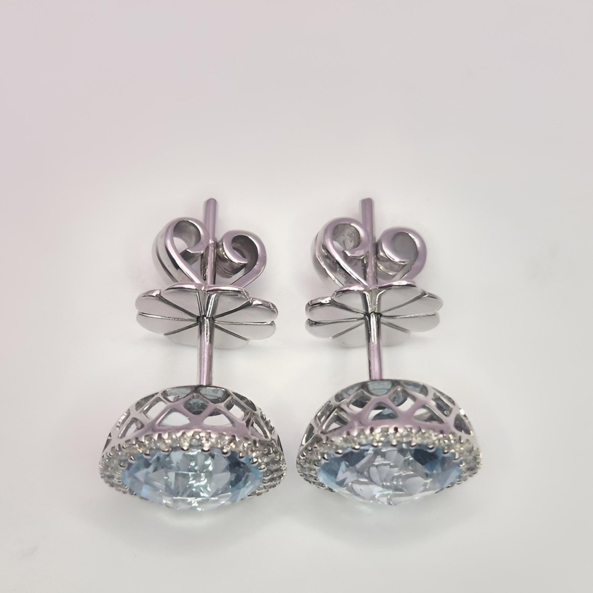 18ct white gold aquamarine and diamond halo cluster stud earrings above view
