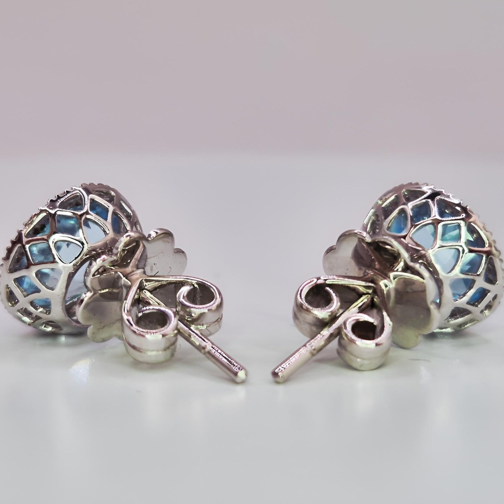 18ct white gold aquamarine and diamond halo cluster stud earrings from behind openned