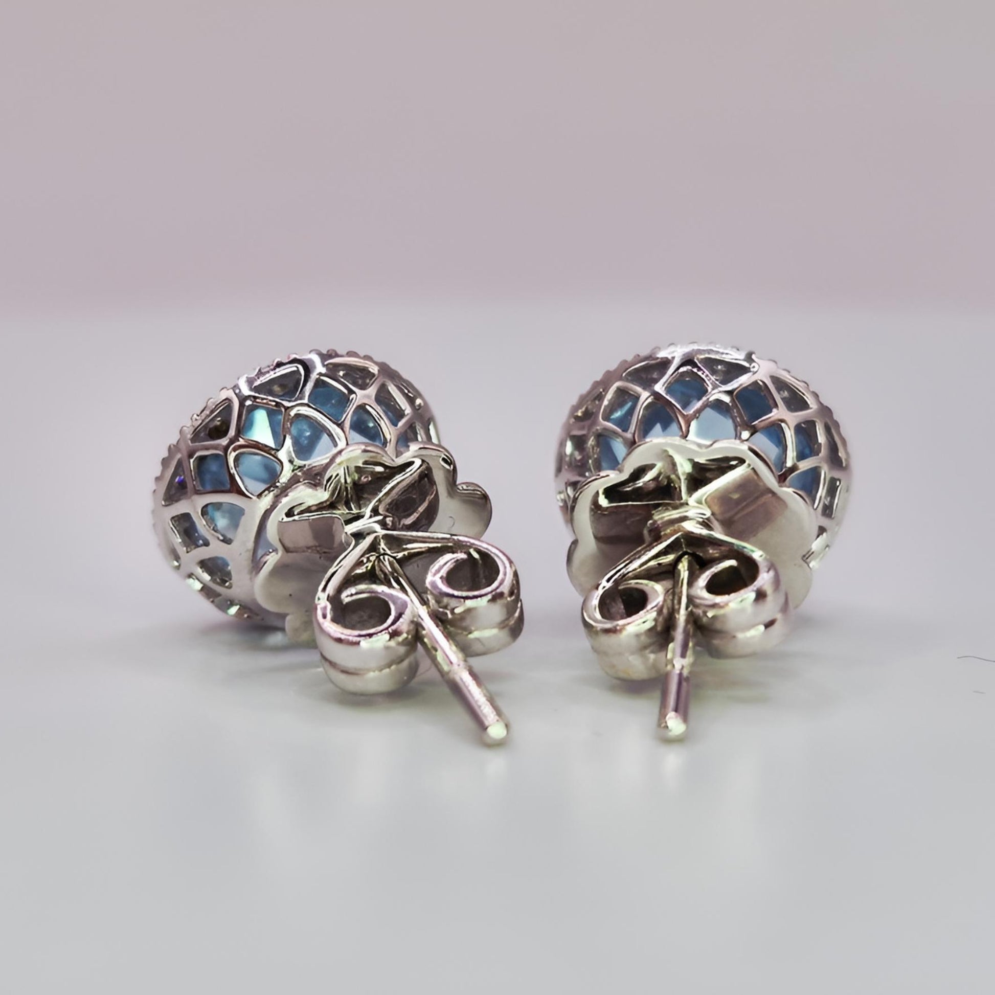 18ct white gold aquamarine and diamond halo cluster stud earrings from behind