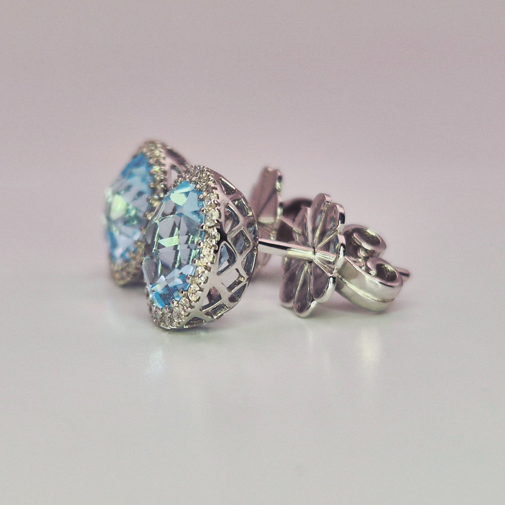 18ct white gold hallmarked aquamarine and diamond halo cluster earrings right left side view