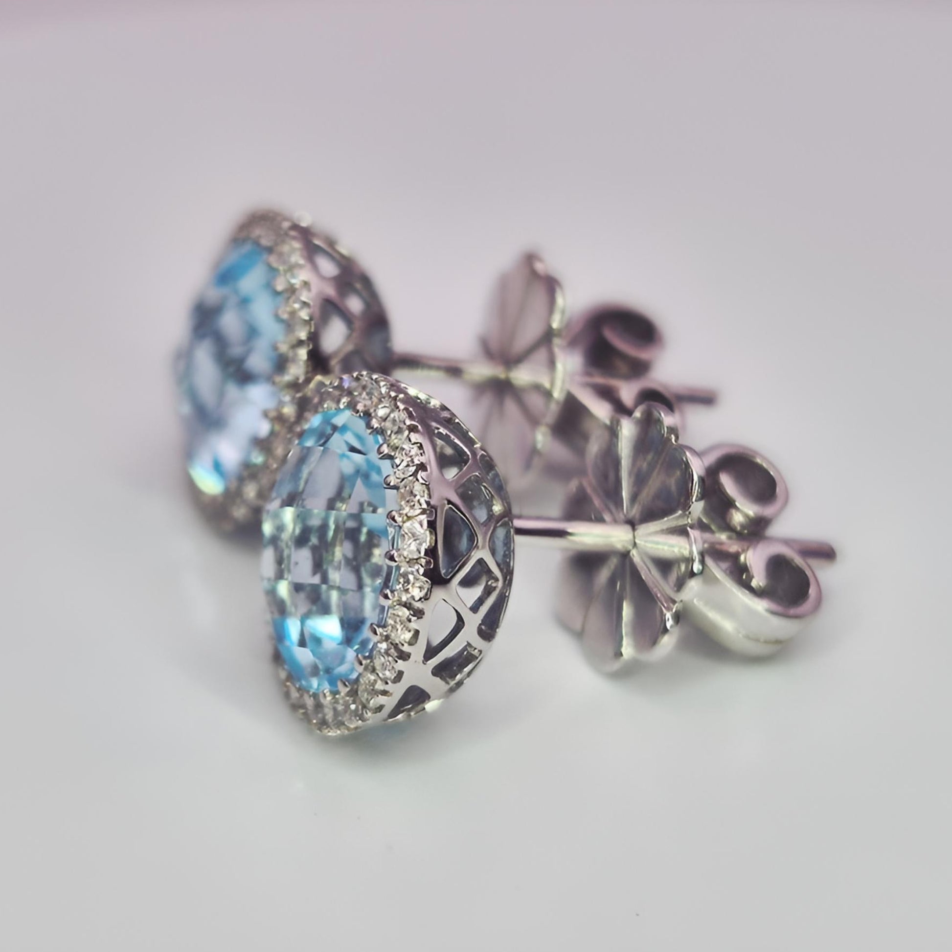 18ct white gold hallmarked aquamarine and diamond halo cluster earrings right left view