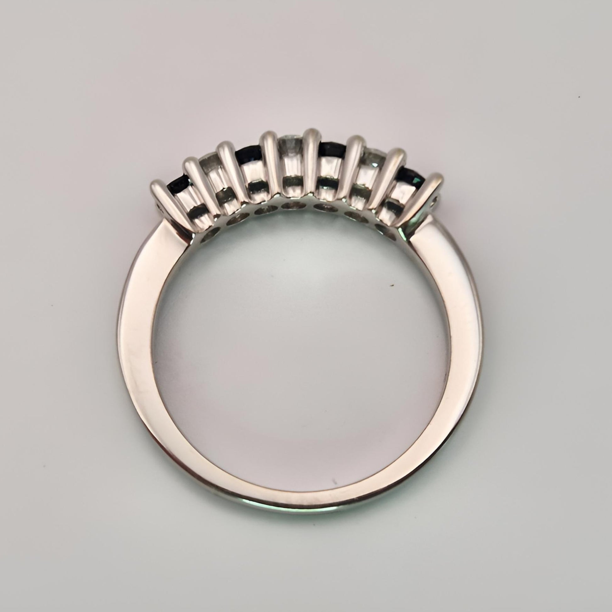 18ct white gold seven stone sapphire diamond half eternity ring above view