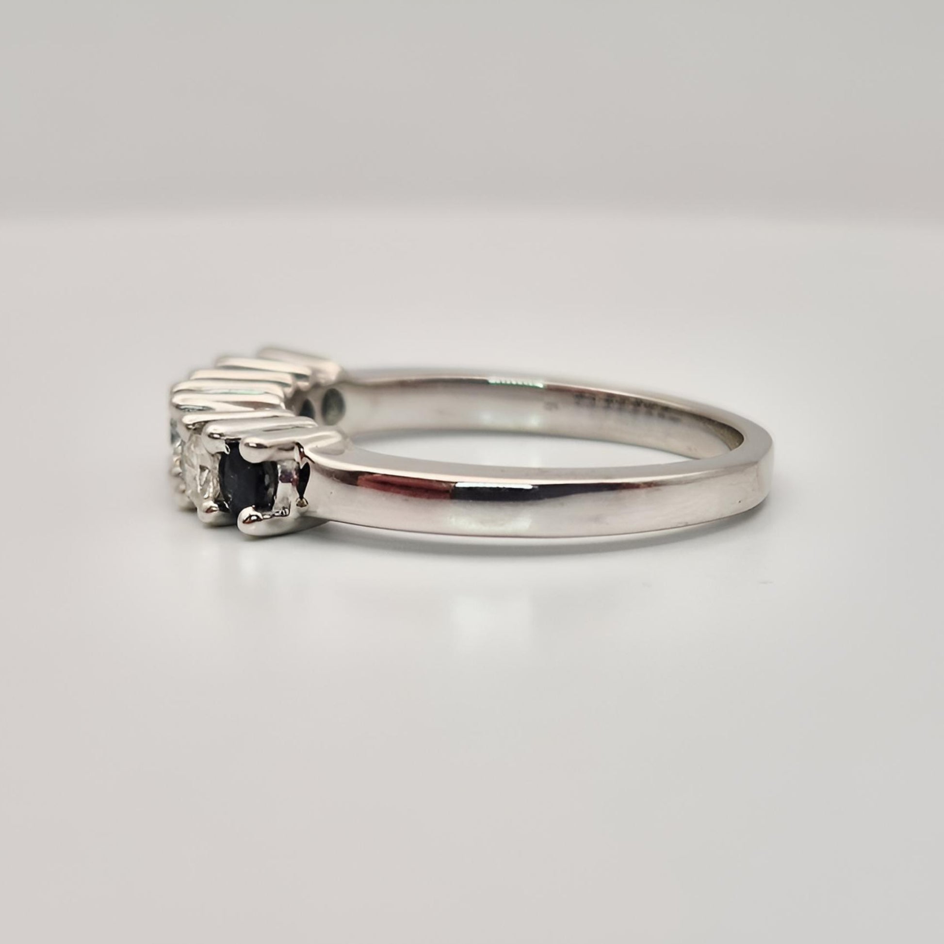 18ct white gold seven stone sapphire diamond half eternity ring left view
