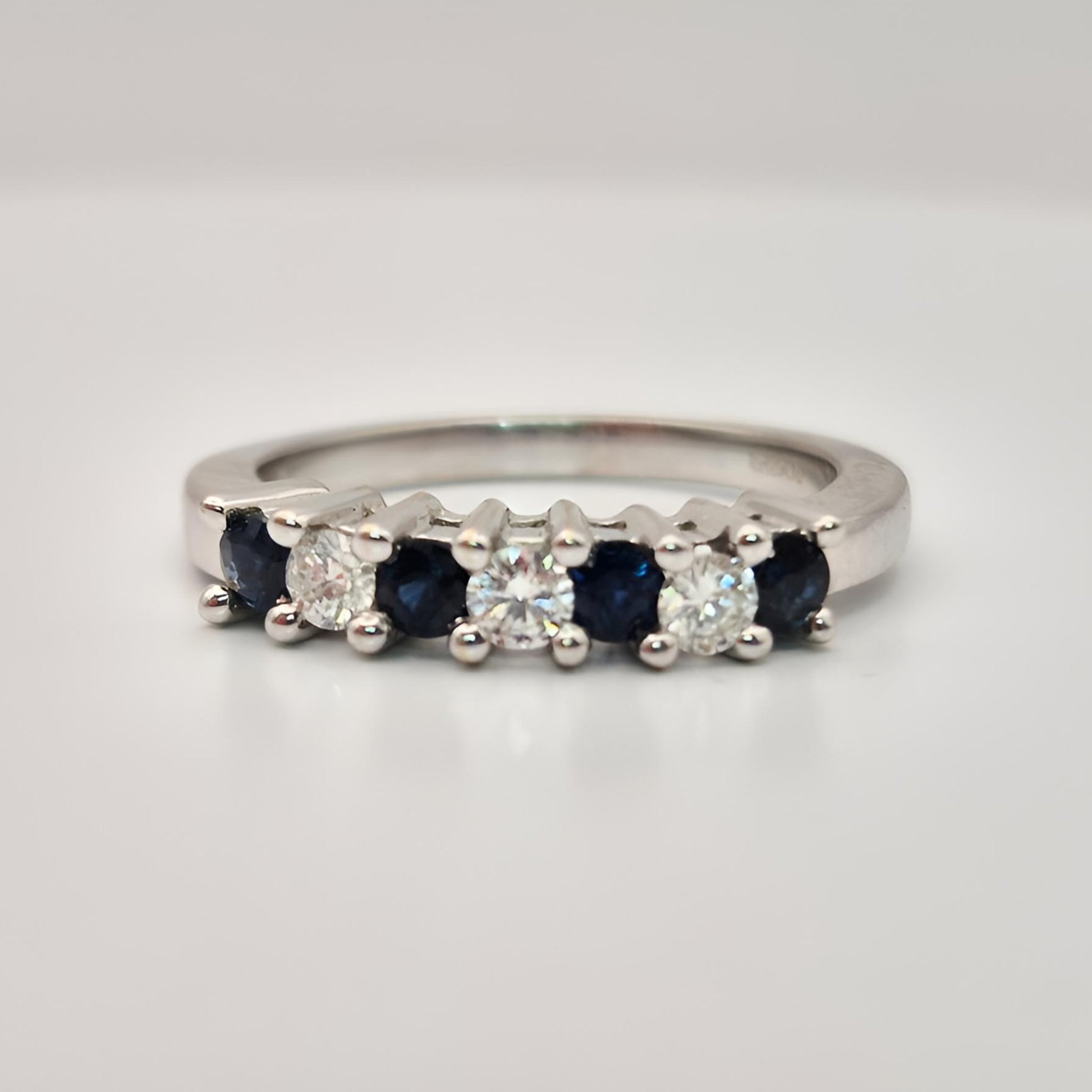 18ct white gold seven stone sapphire diamond half eternity ring opposite