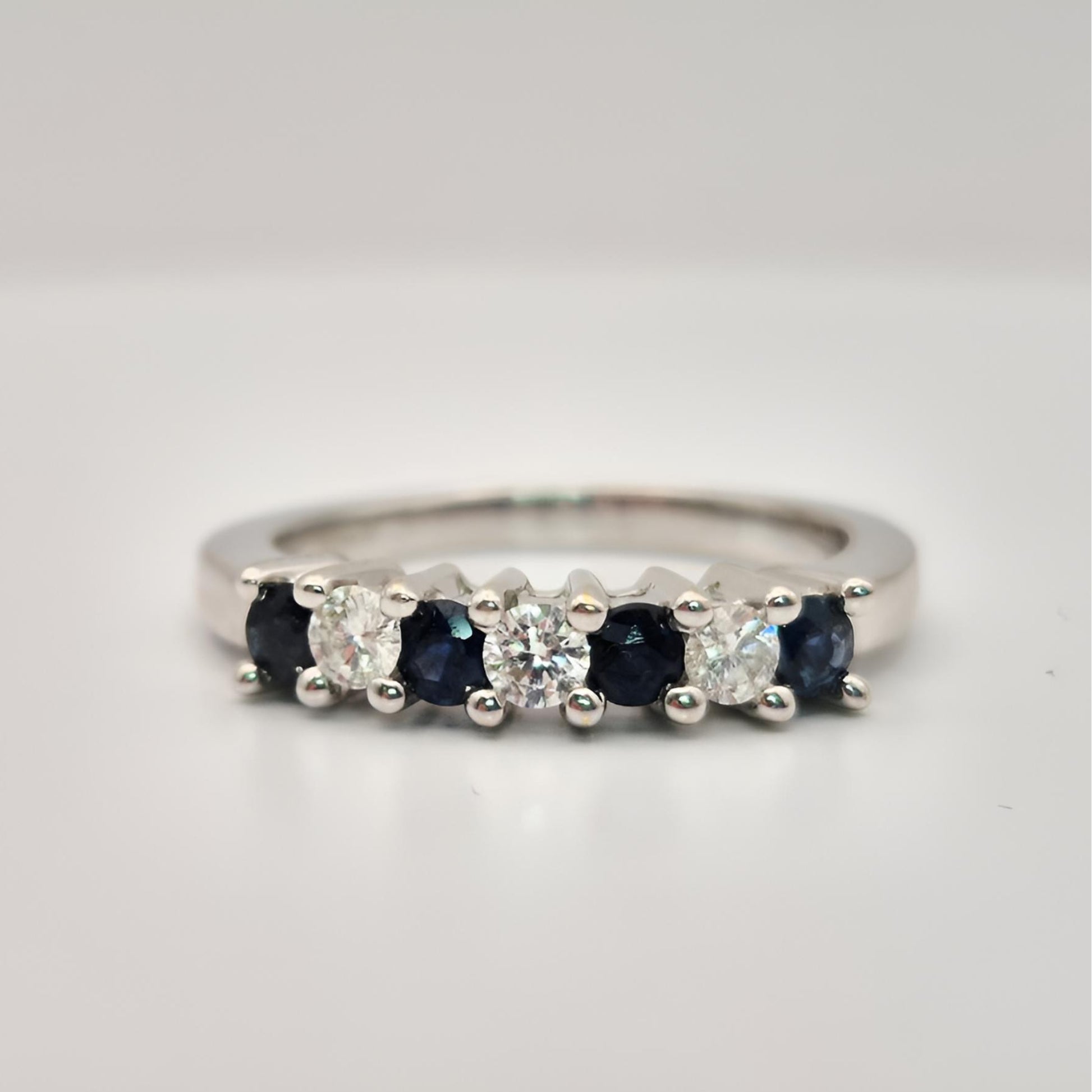 18ct white gold seven stone sapphire diamond half eternity ring setting font view