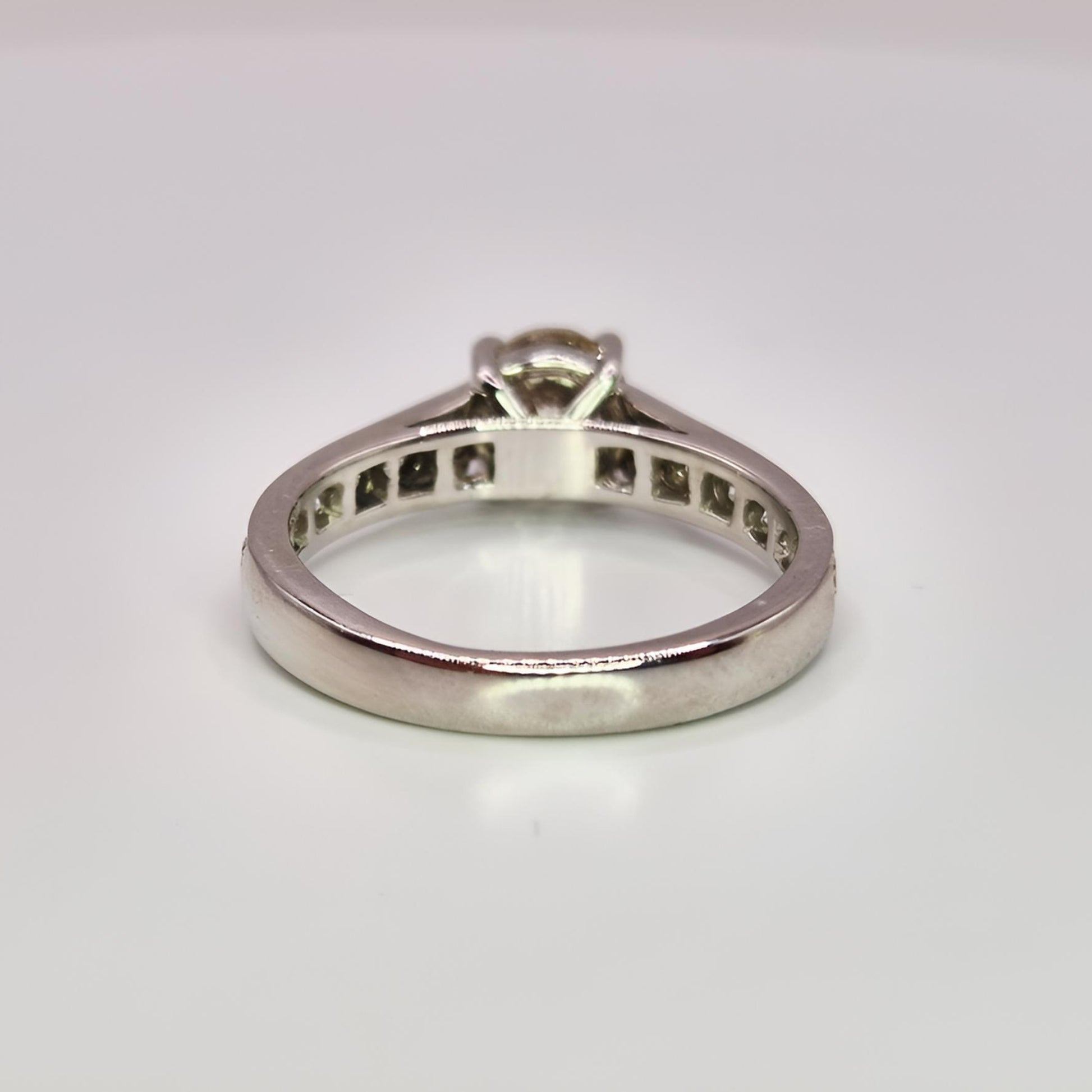 18ct white gold single stone diamond shoulders ring from behind zoom on shank