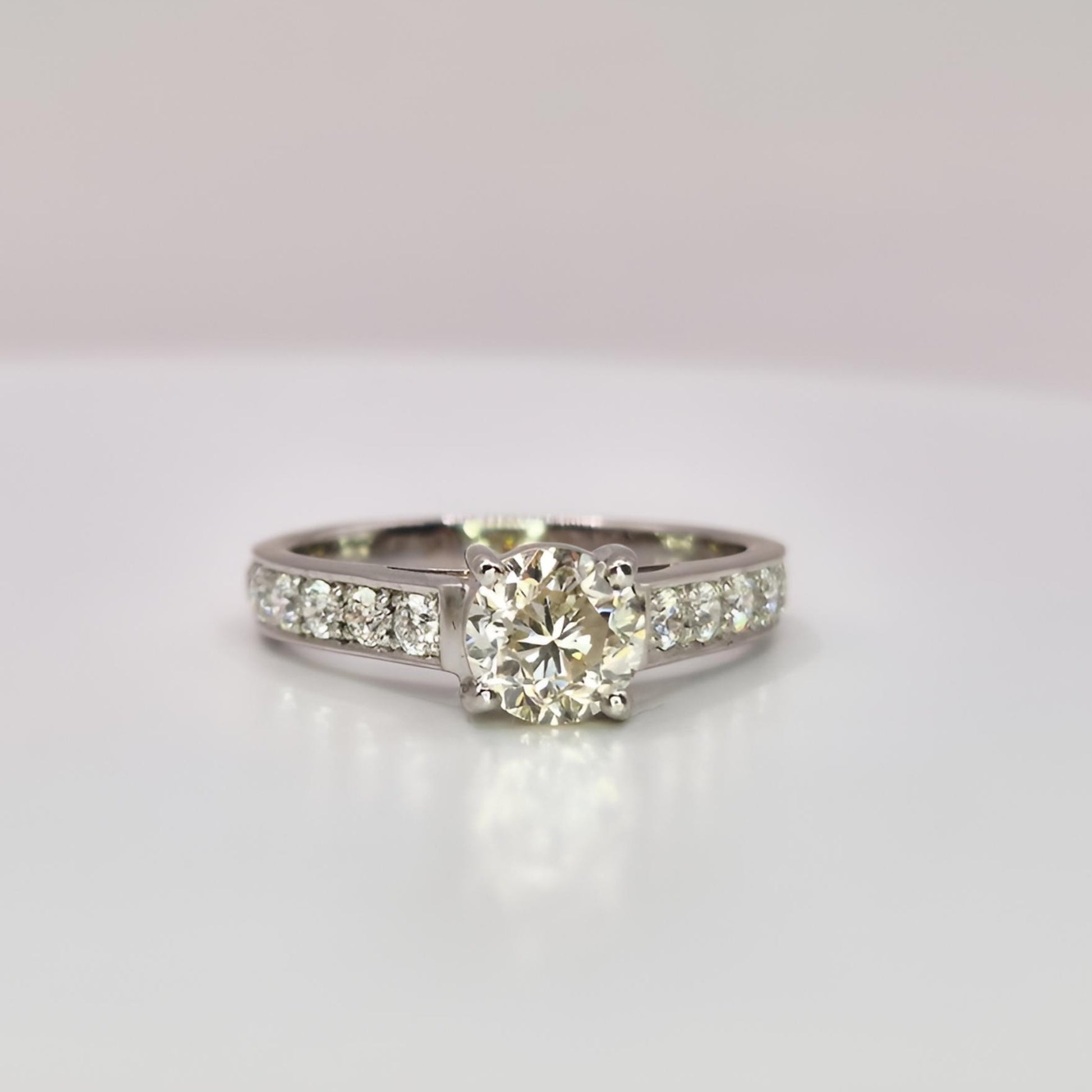 18ct white gold single stone diamond shoulders ring from upside down