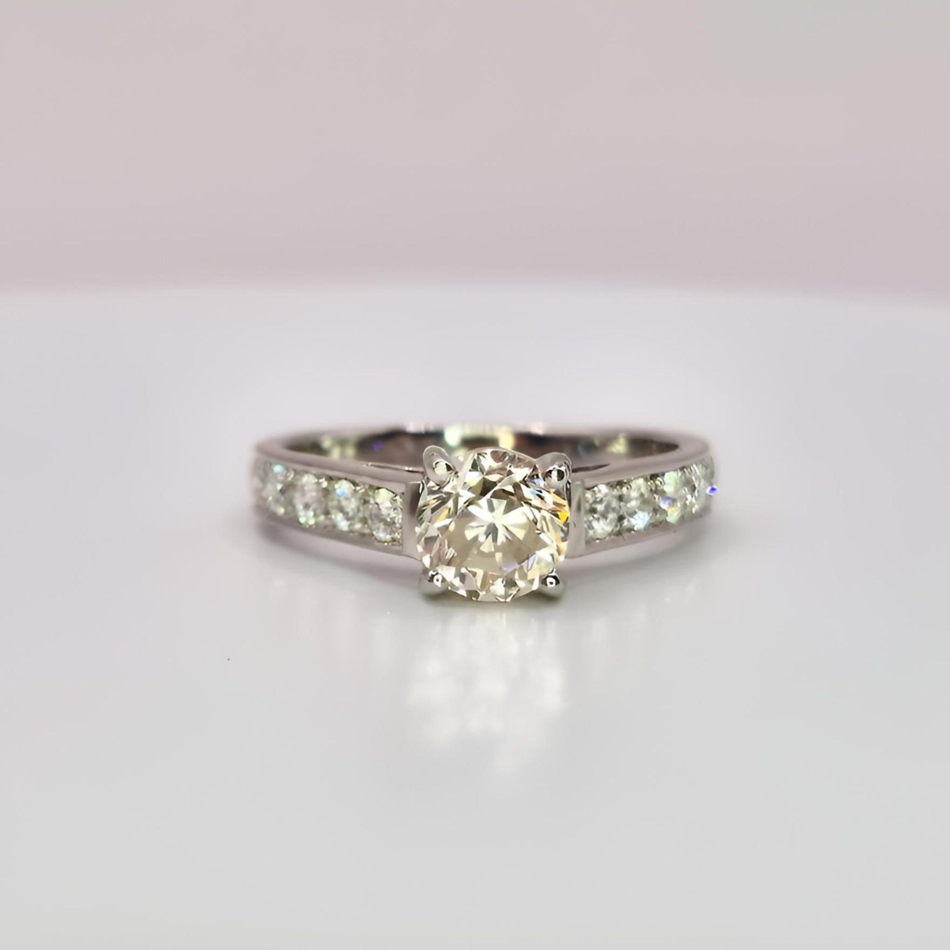 18ct white gold single stone diamond shoulders ring front view