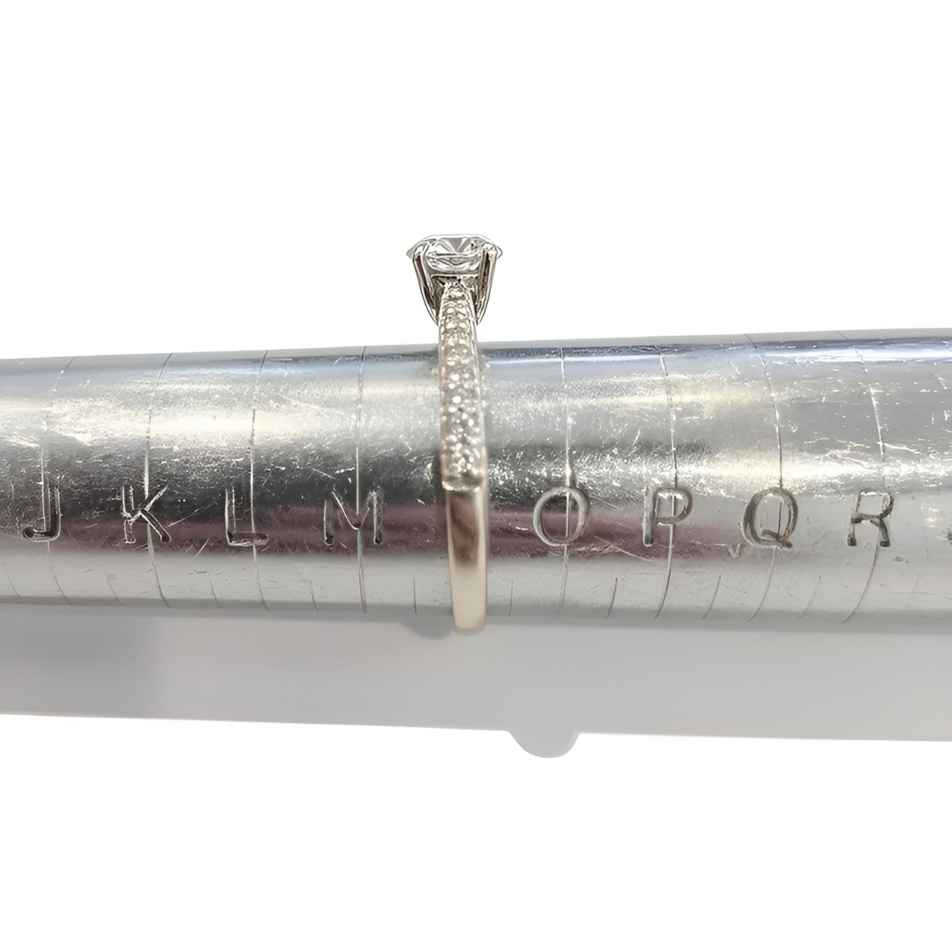 18ct white gold single stone diamond shoulders ring size N on ring stick