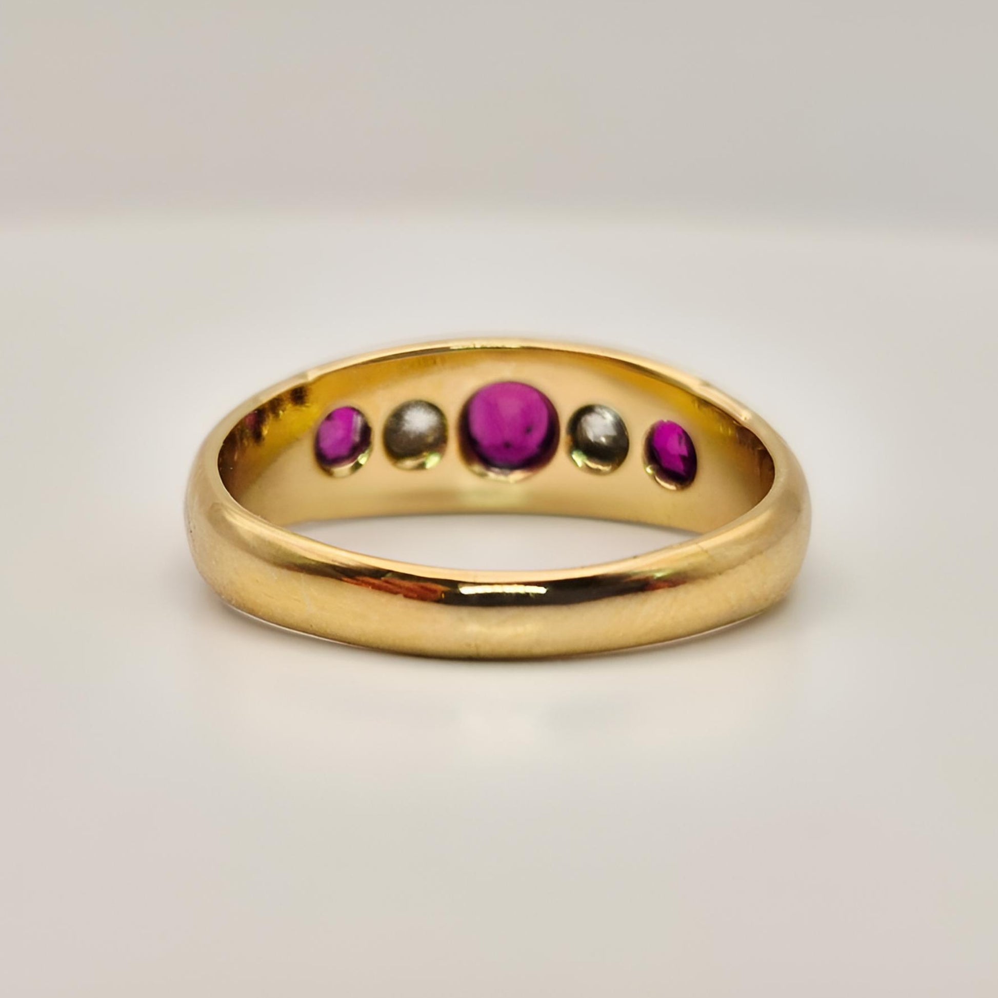 18ct yellow gold ruby diamond five stone ring from behind view zoom on shank