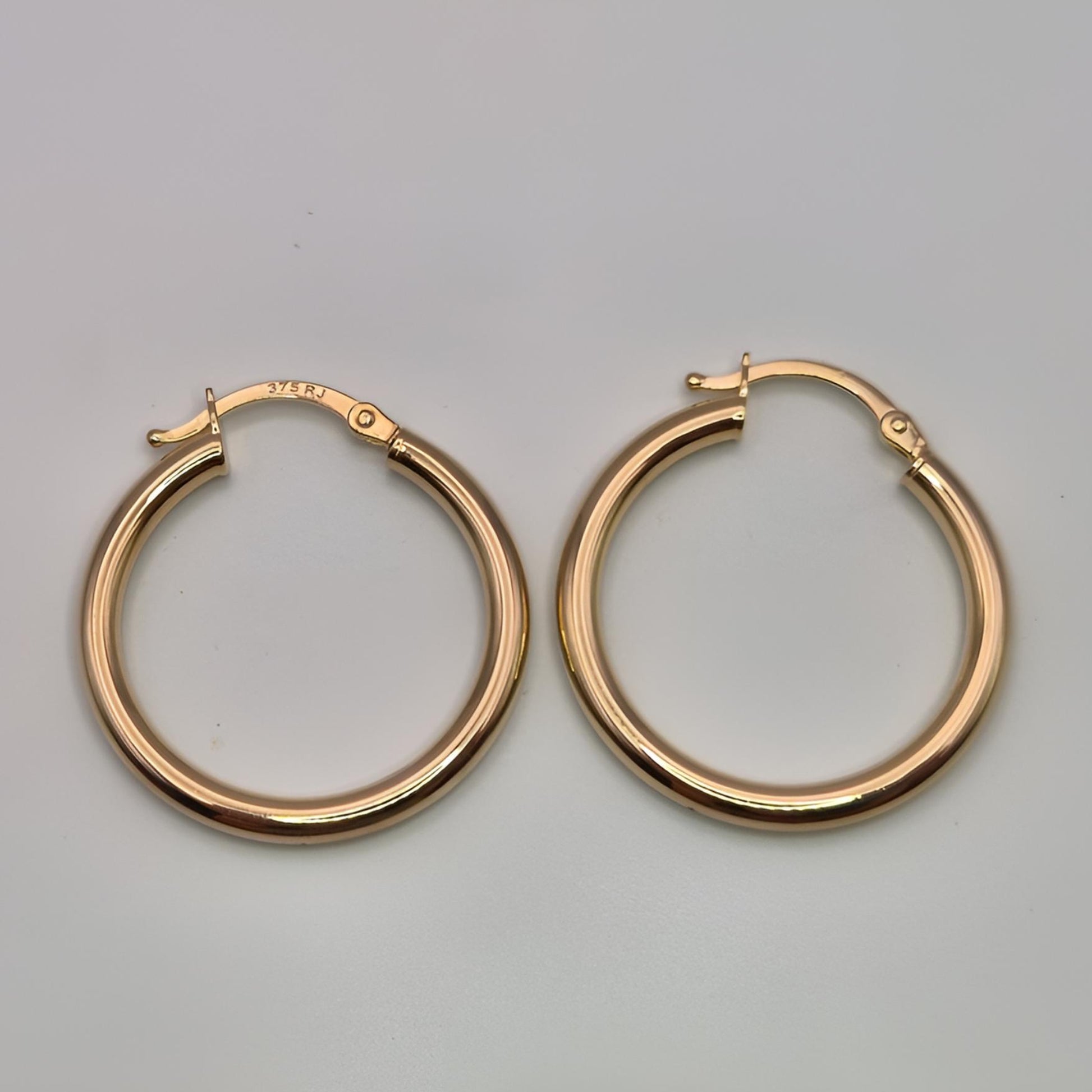 375 gold 20mm hoop earrings flat view