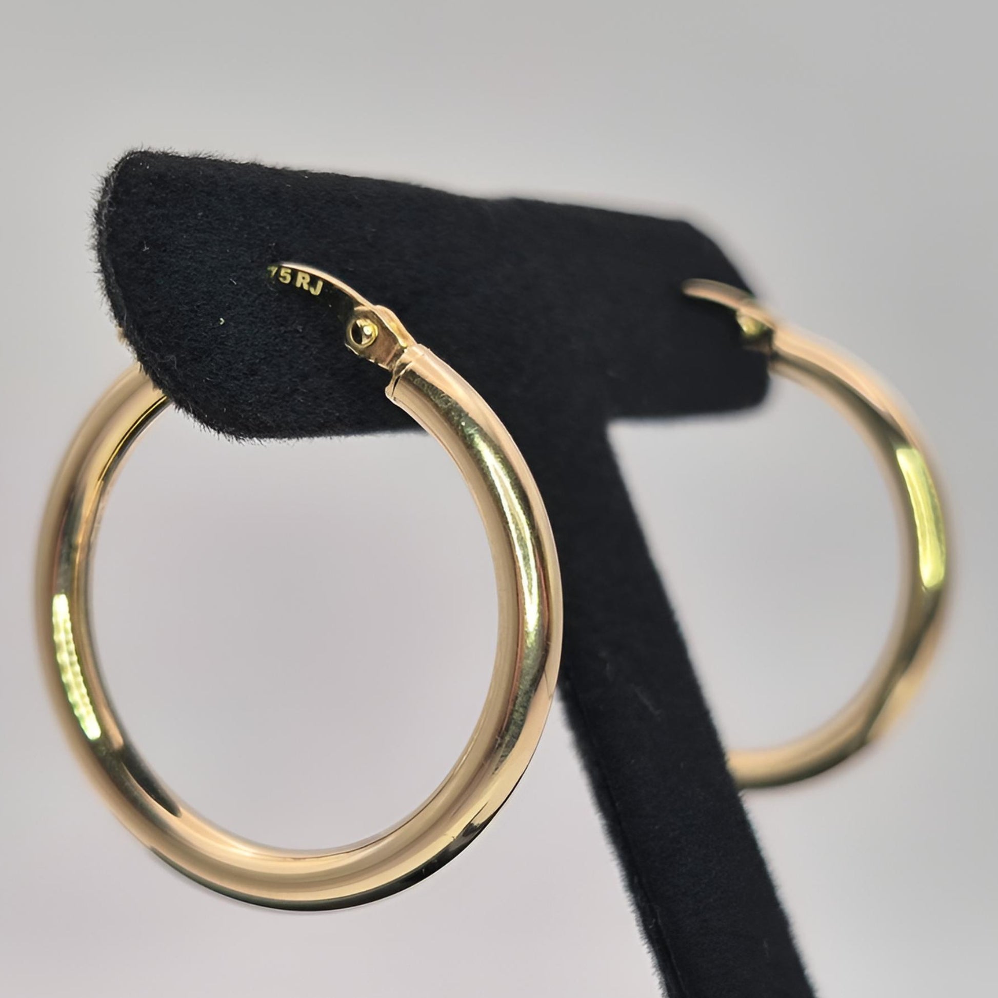 375 gold 20mm hoop earrings on display right view