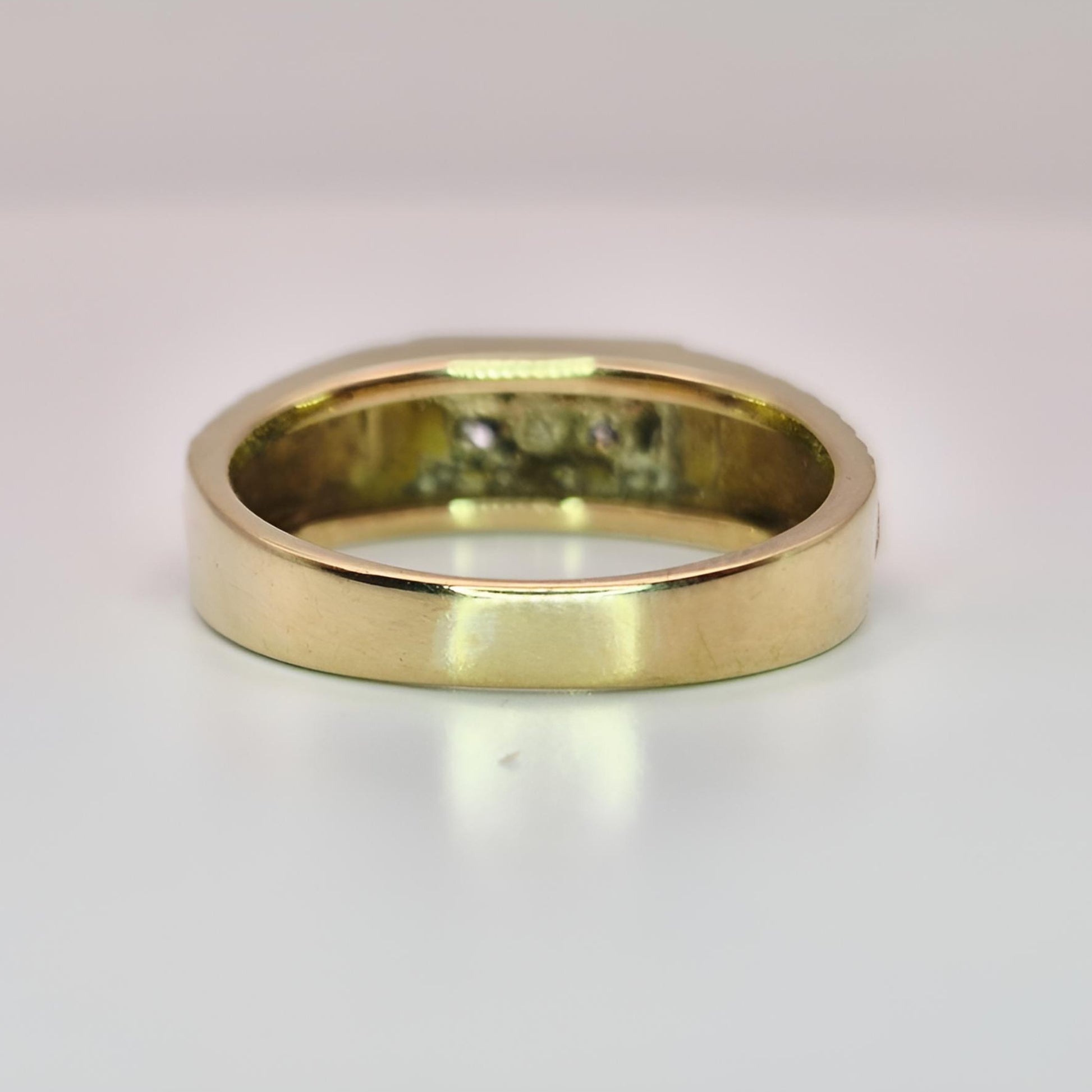9ct yellow gold hallmarked two stone diamond ring on ring from behind