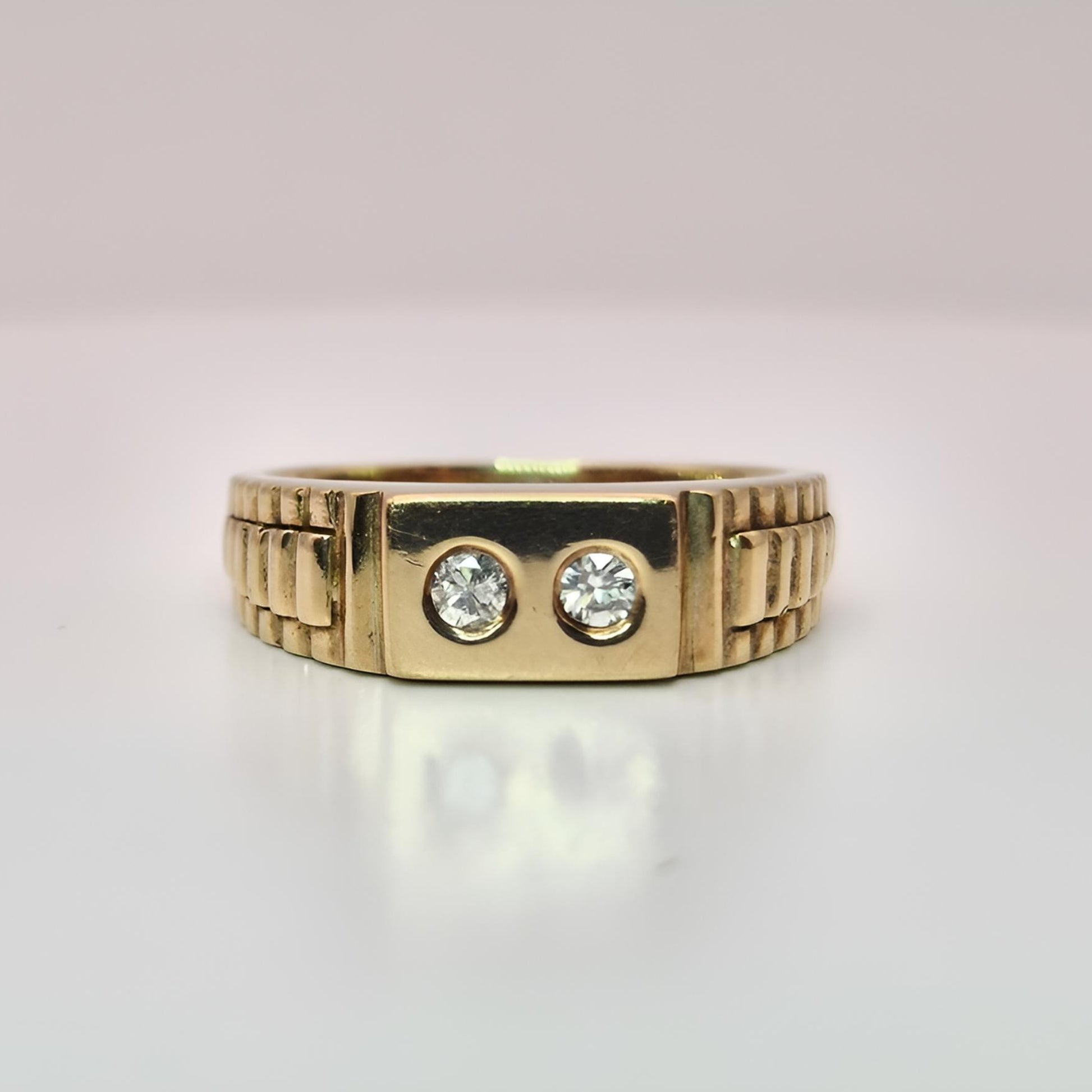9ct yellow gold hallmarked two stone diamond ring on ring front view