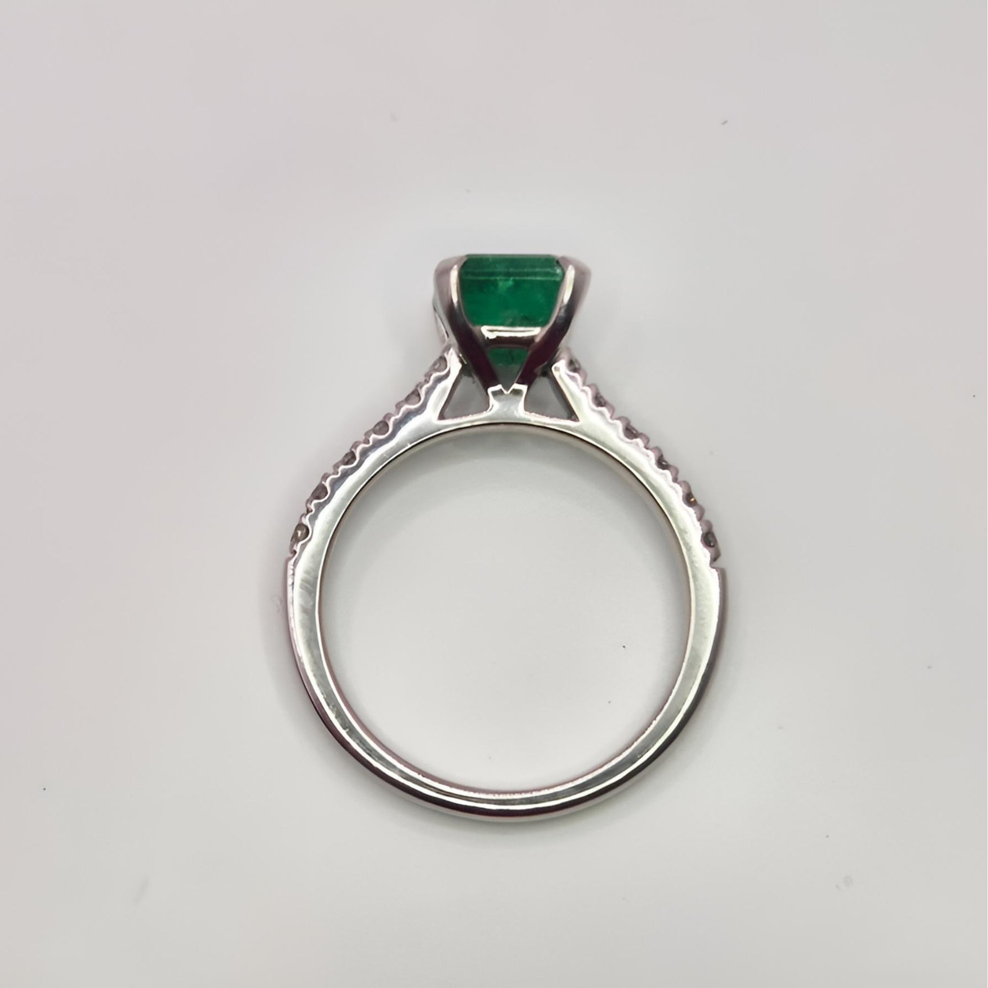 buish green emerald ring above