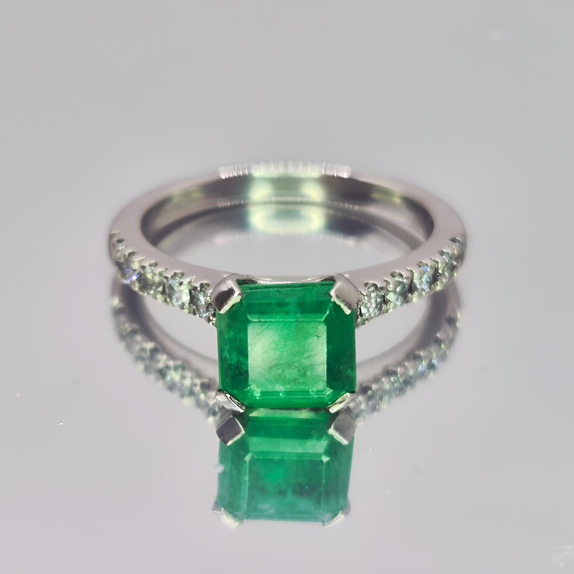 buish green emerald ring close front above by sofitgold