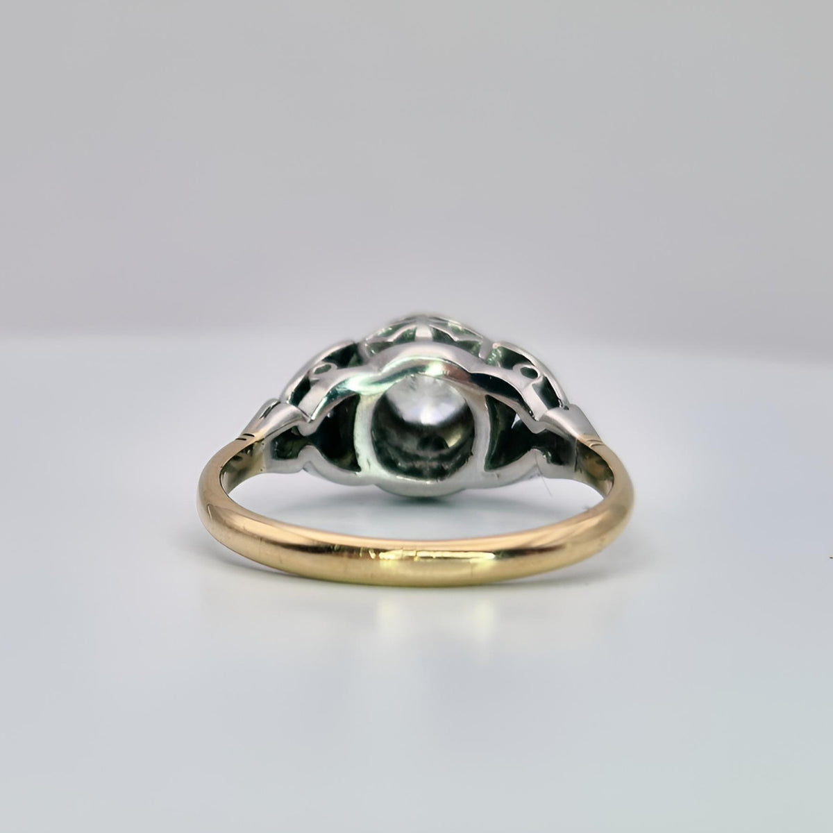 fully hallmarked 18ct yellow gold single stone diamond ring collet from behind view