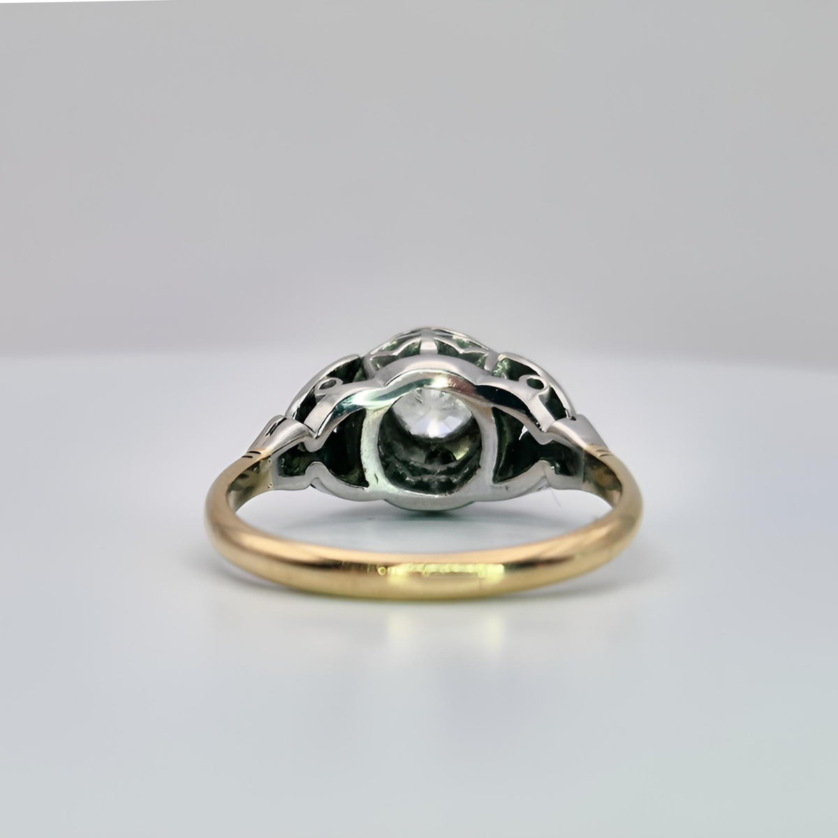 fully hallmarked 18ct yellow gold single stone diamond ring collet from behind
