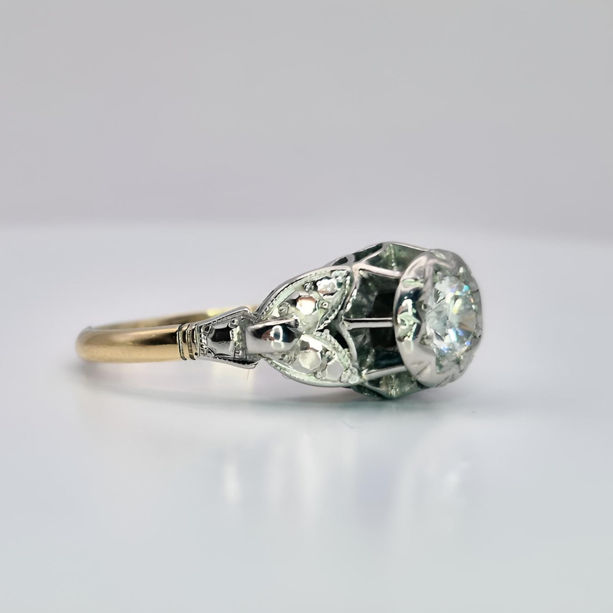 fully hallmarked 18ct yellow gold single stone diamond ring collet left side view
