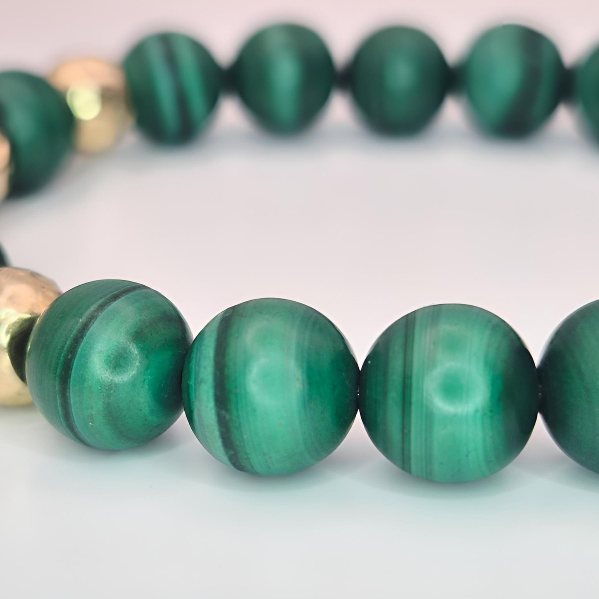 malachite gold bead bracelet closer side view