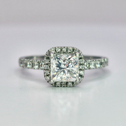 platinum diamond halo diamond set collet and diamond set shoulder ring front view