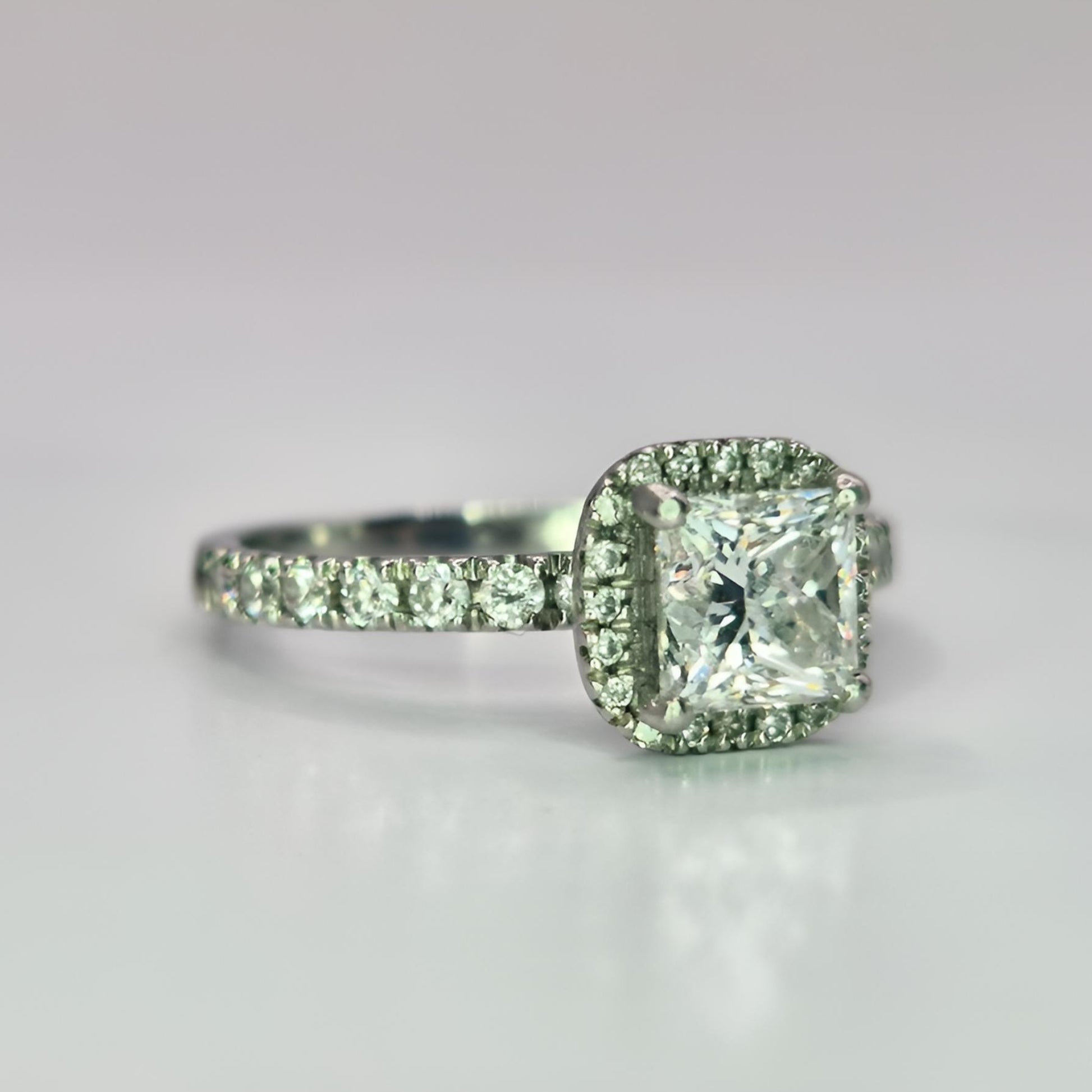 platinum diamond halo diamond set collet and diamond set shoulder ring side view