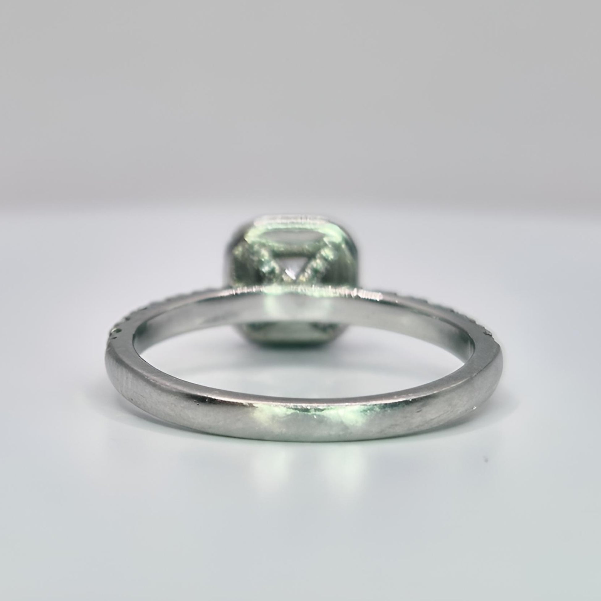 platinum diamond halo diamond set collet and shoulder ring behind shank view