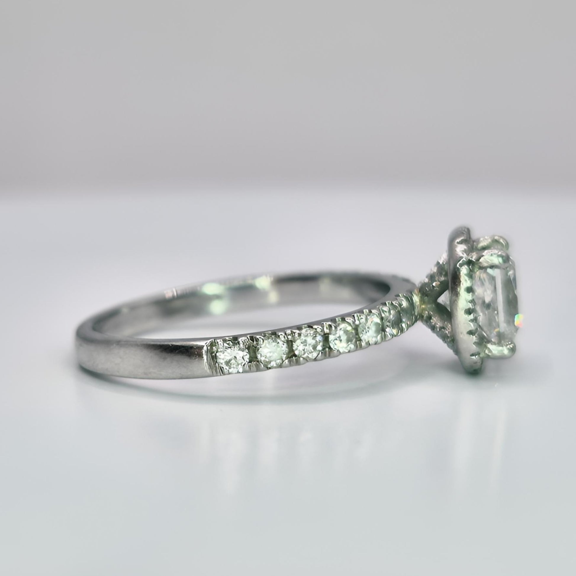 platinum diamond halo diamond set collet and shoulder ring right view