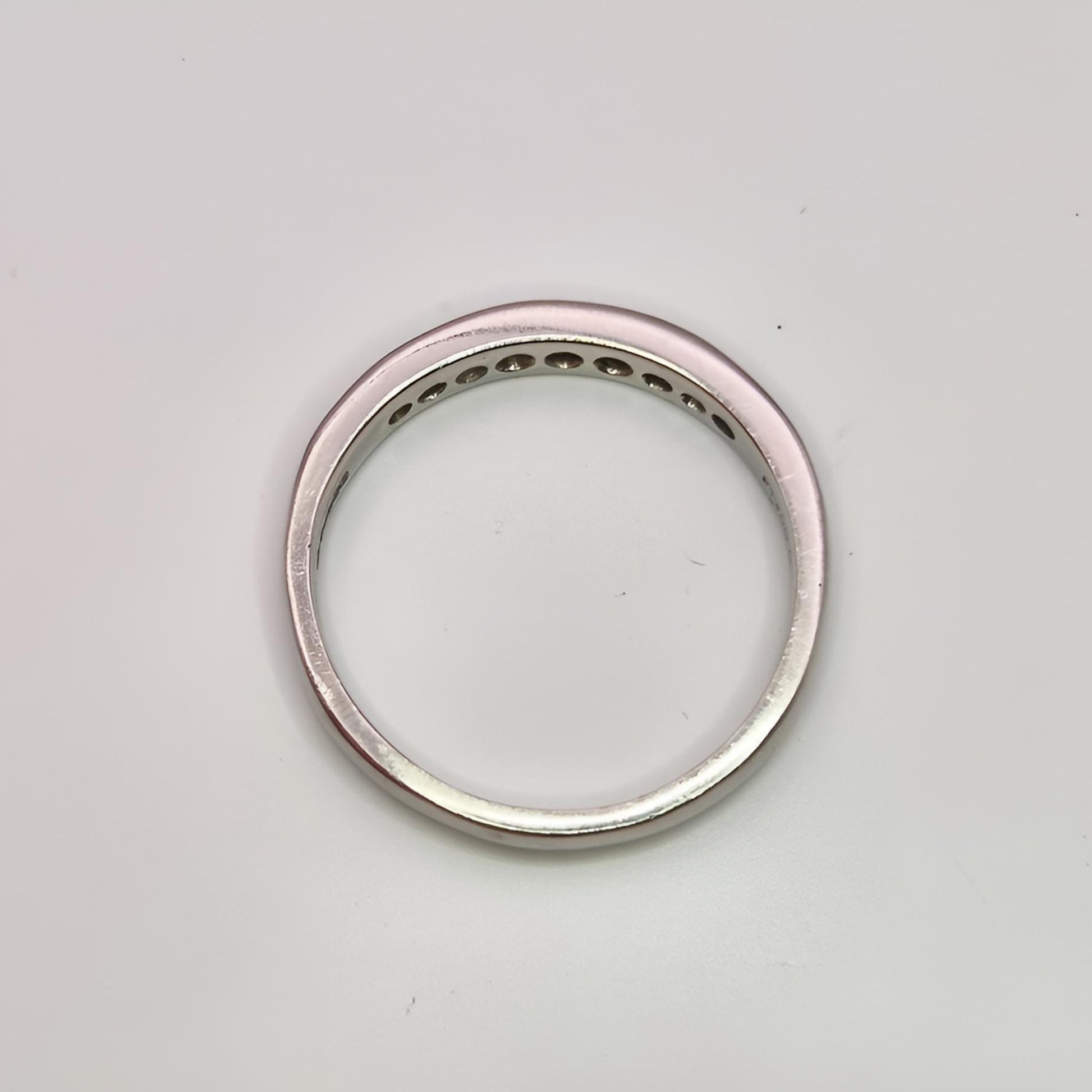 platinum hallmarked diamond half eternity ring from above