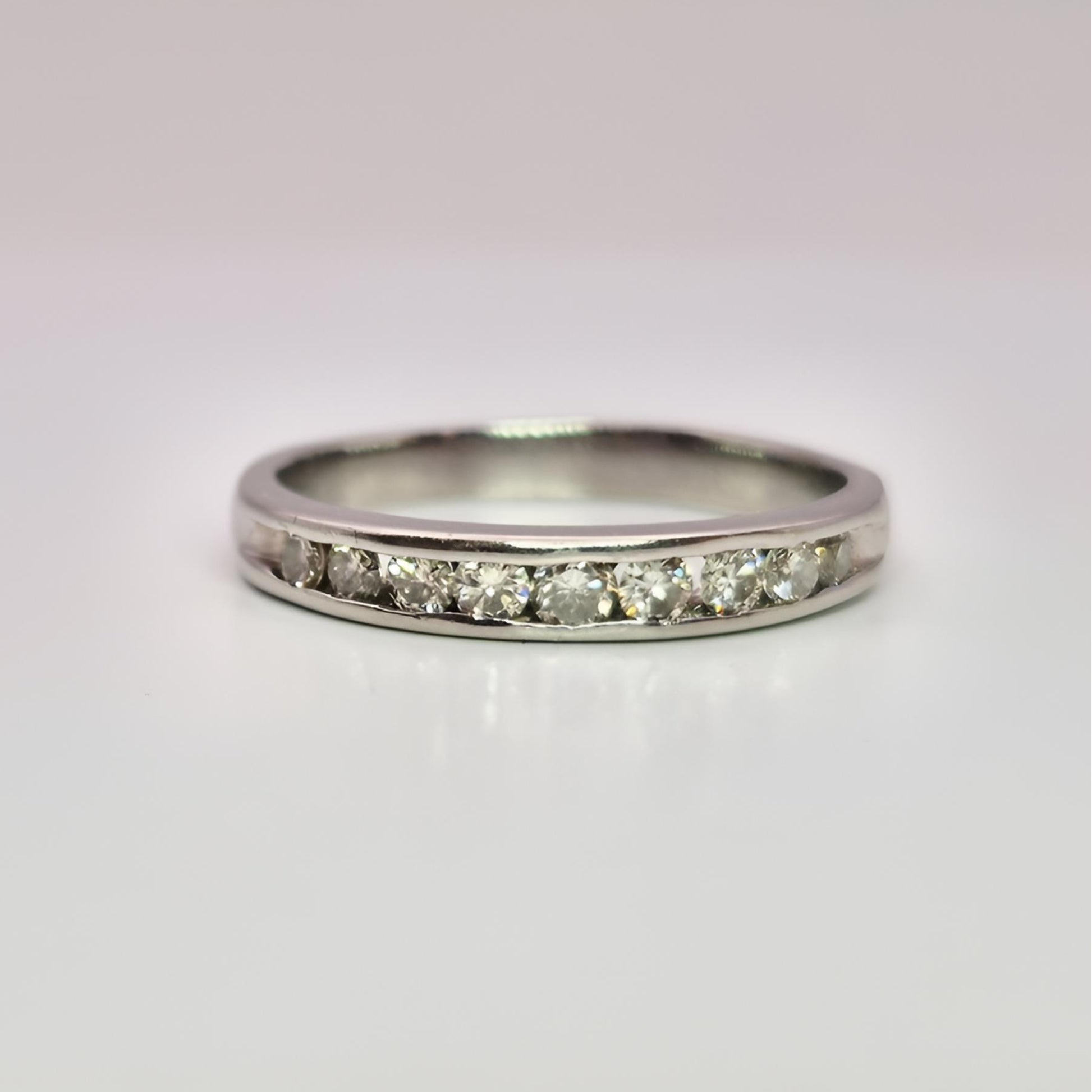platinum hallmarked diamond half eternity ring upside down front view
