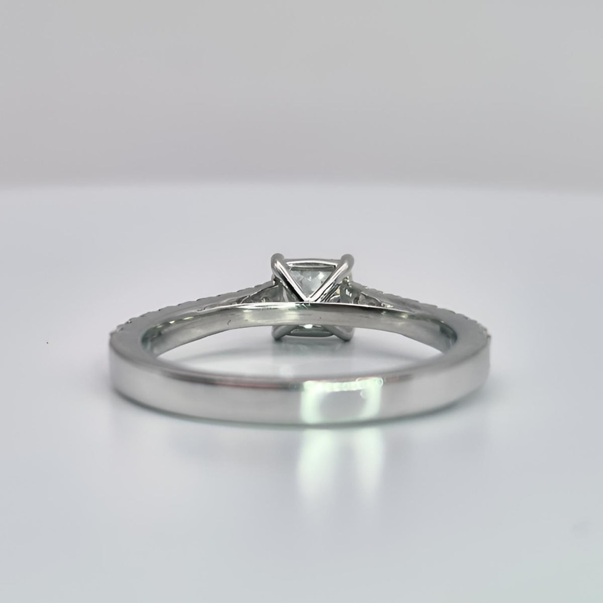 platinum princess cut single stone diamond shoulder hallmarked ring collet view from behind