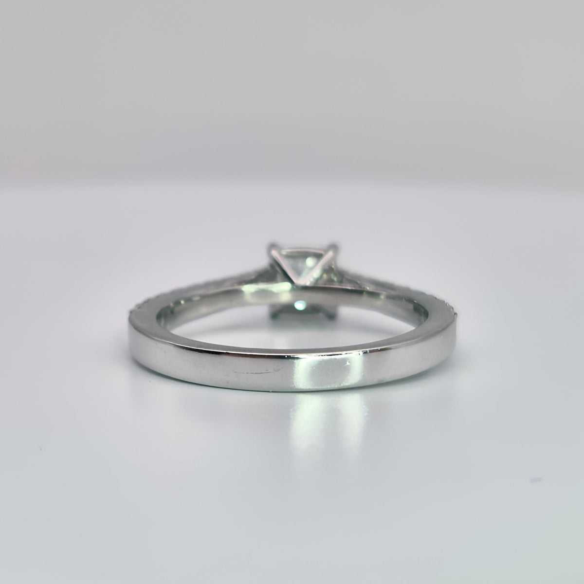 platinum princess cut single stone diamond shoulder hallmarked ring view from behind