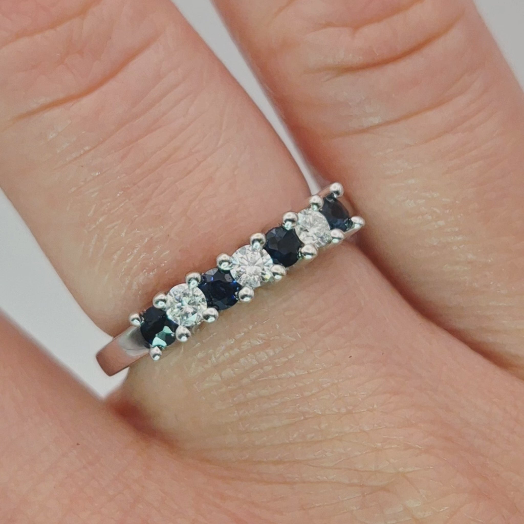 18ct white gold sapphire and diamond 7 stone eternity ring on finger video