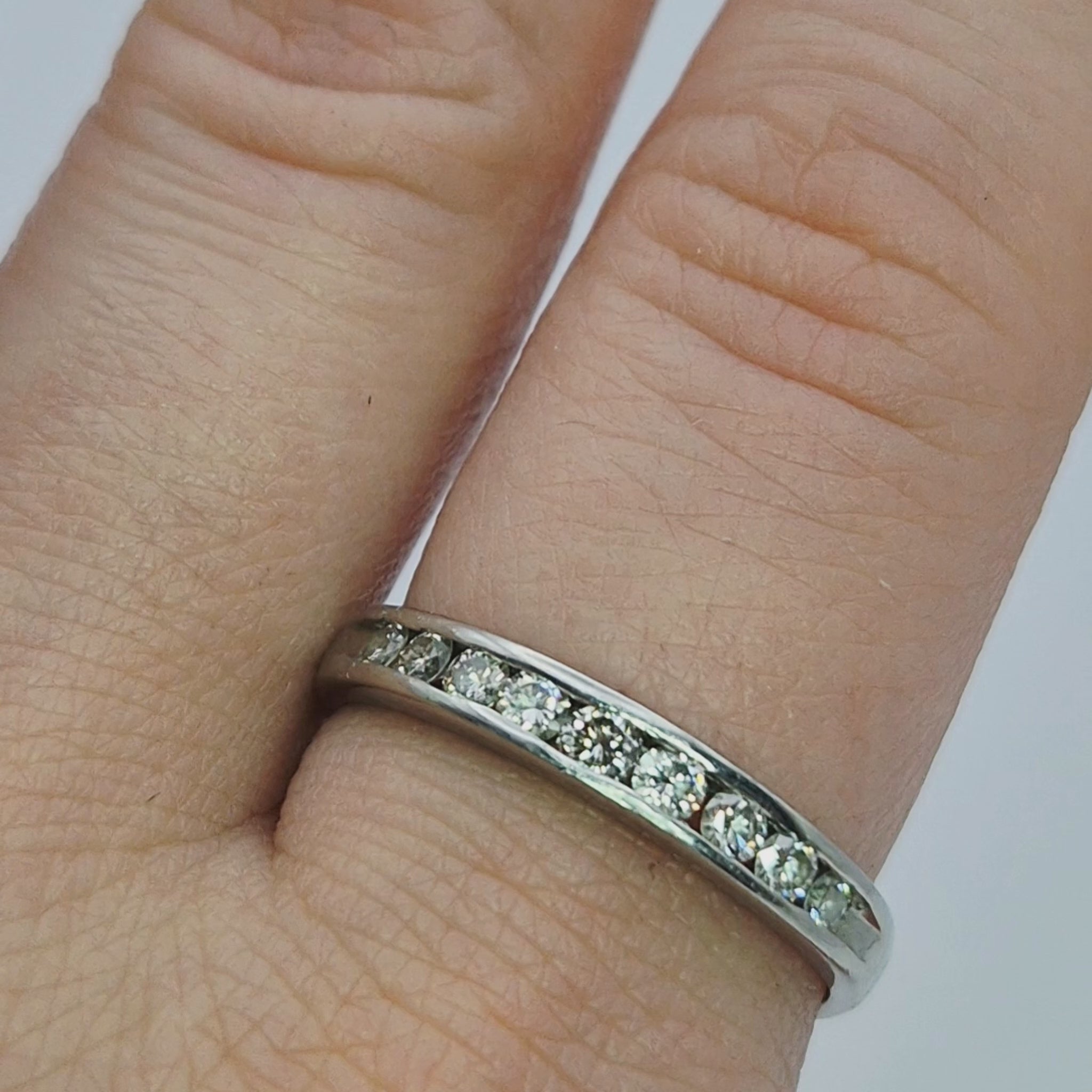 platinum diamond half eternity ring on finger video