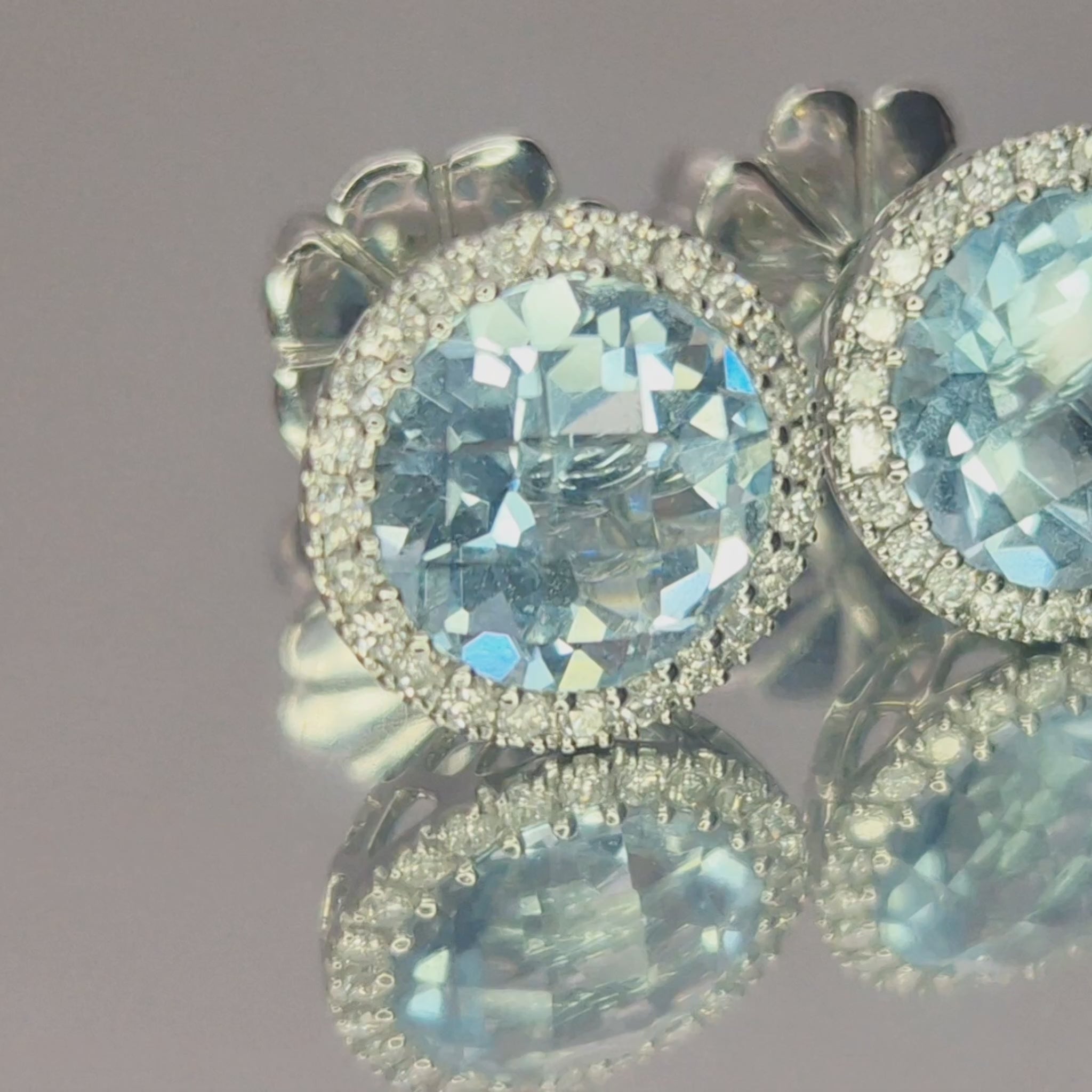 18ct white gold aquamarine diamond halo cluster stud earrings video on turn table